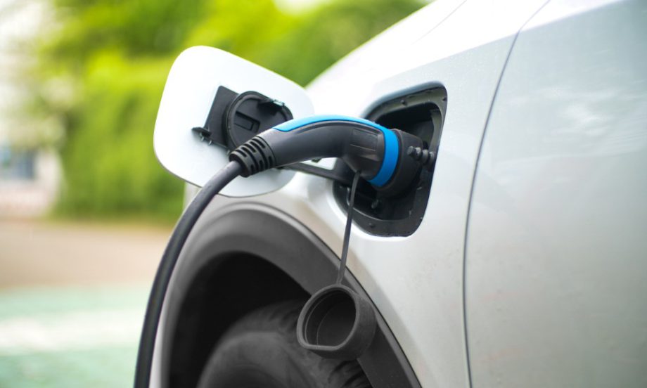 An electric vehicle at a charging station